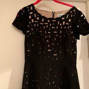 Great, fancy knee length dress.